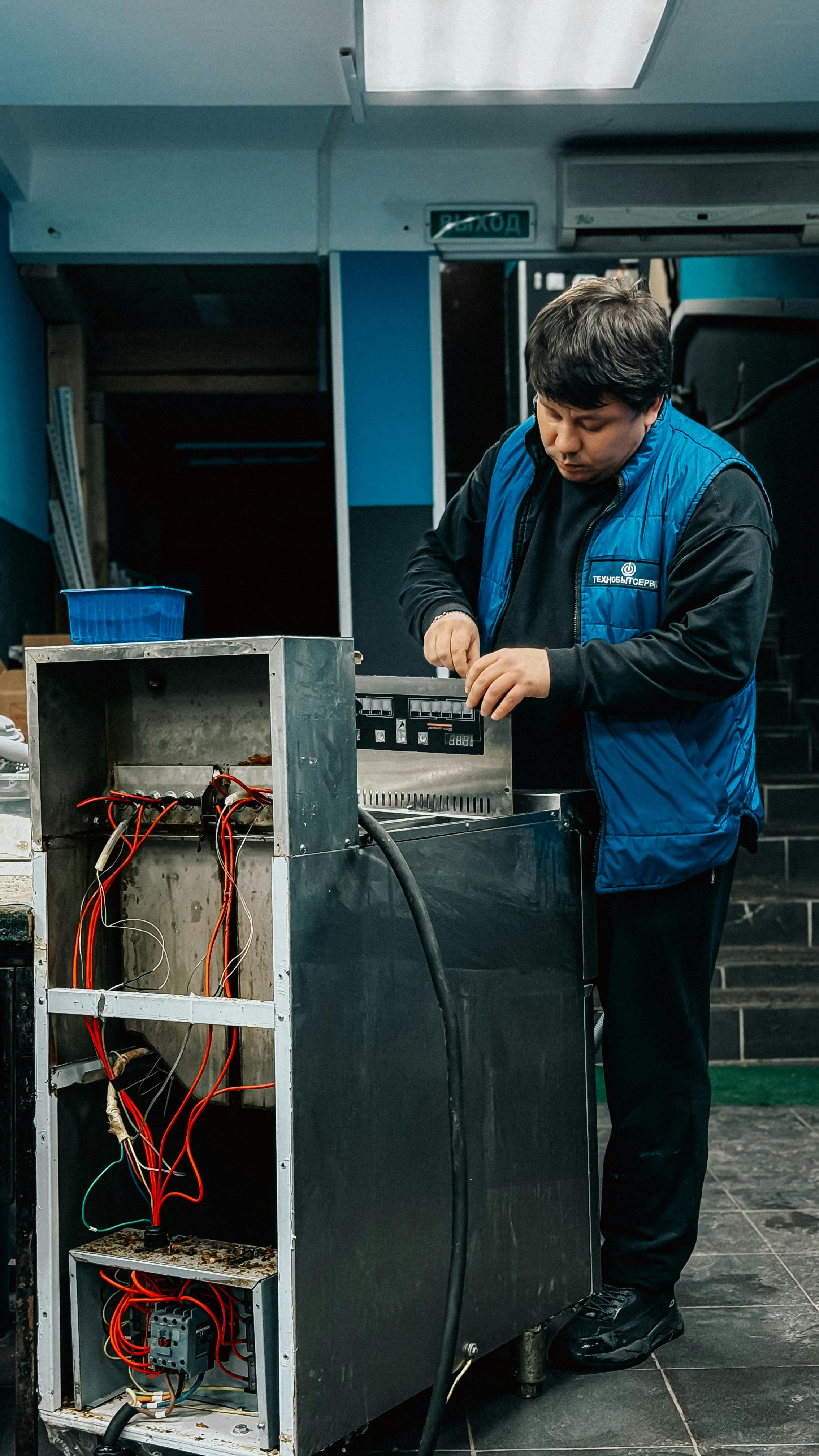 Zibuke OnCall technician repairing your tumble dryer with expert care